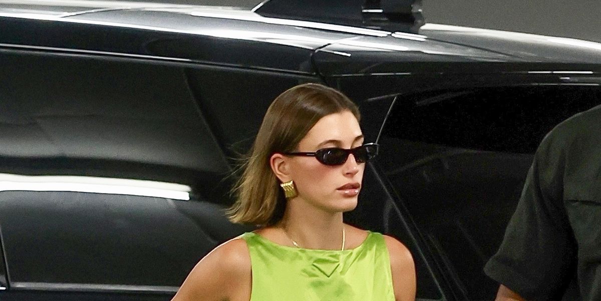 Hailey Bieber gives a hint of midriff in crop top and flared pants during  flurry of selfie photos