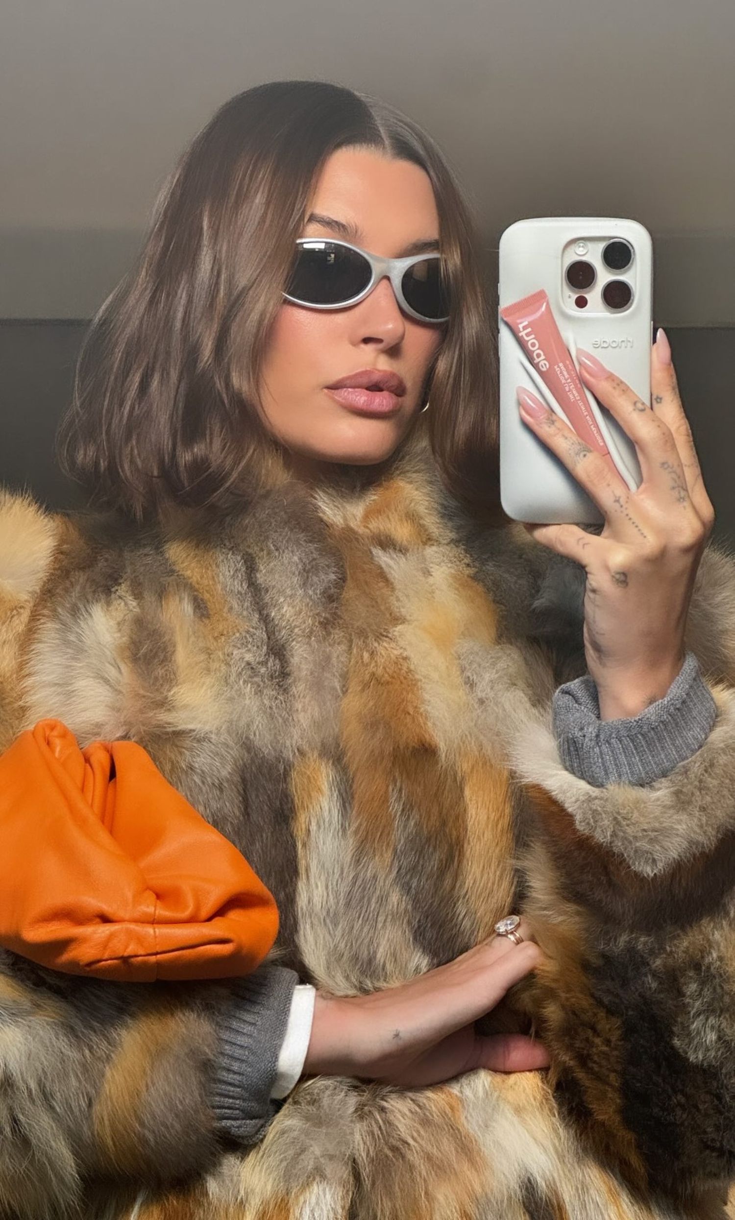 Hailey Bieber Channels The Mob Wife Aesthetic In Fur Coat
