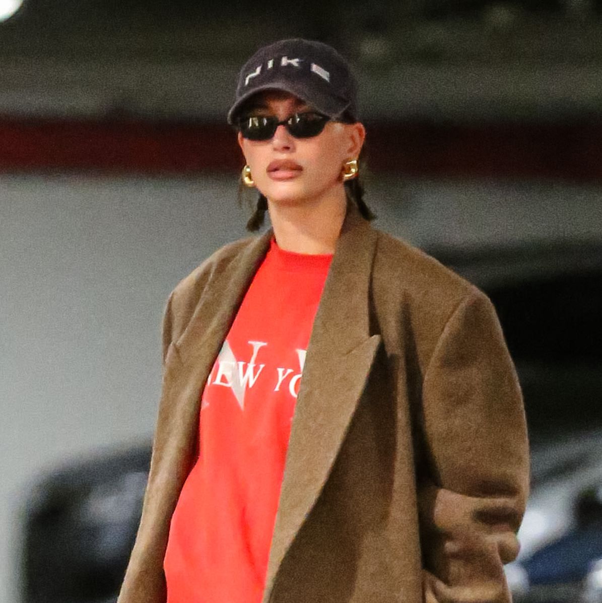 Hailey Bieber Reps The No Pants Trend Again in XXL Coat and Ballet Flats