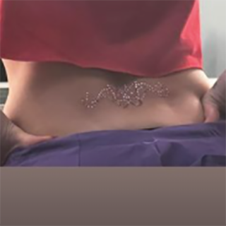 hailey bieber back tattoo
