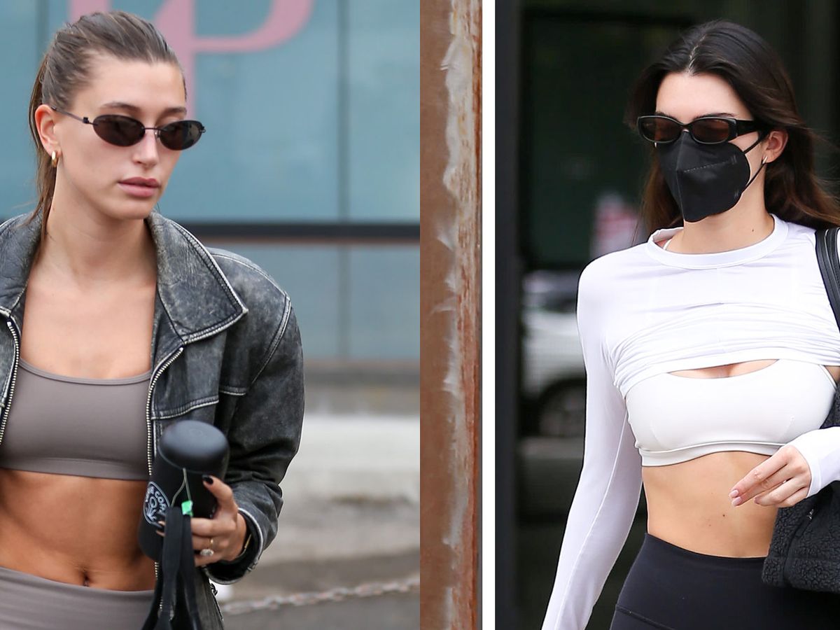 Kendall Jenner shows off tight abs in a sports bra & leggings after being  accused of getting lip fillers