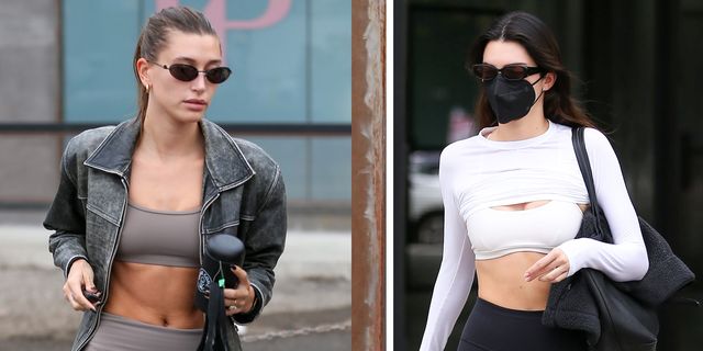 Kendall Jenner rocks a black sports bra and leggings with a leather jacket  as she leaves