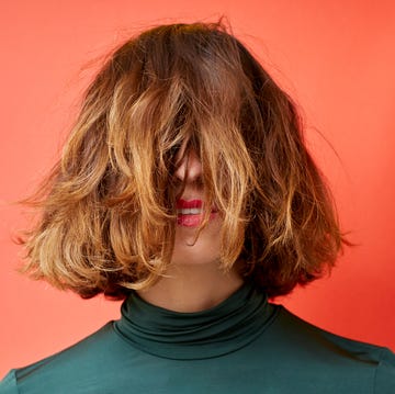 woman with hair in front of her face