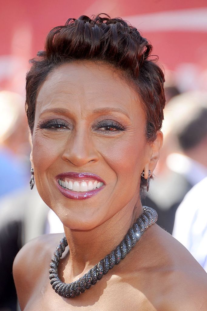 hairstyles for women over 50 robin roberts with short curls