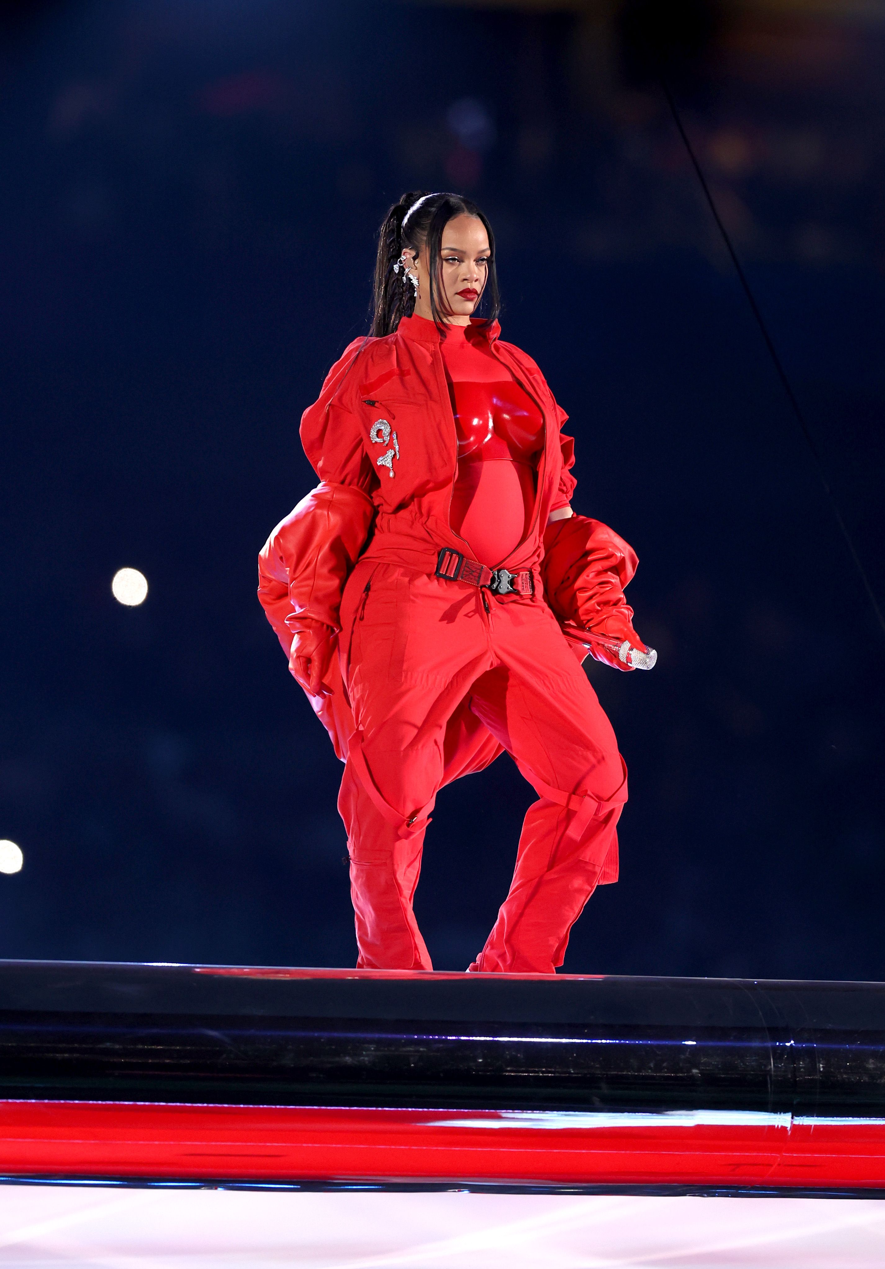 Rihanna unveils pregnancy during hit Super Bowl halftime