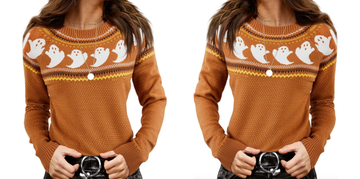 a woman wearing an orange sweater with ghosts on it