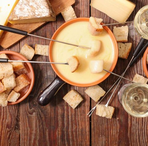 cheese fondue with bread skewers