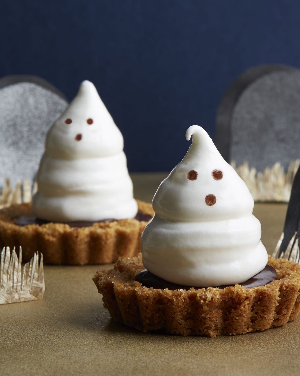 meringue ghost tartlets in a little paper graveyard