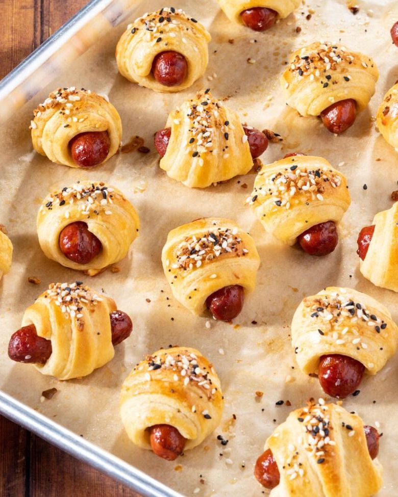 pigs in a blanket on sheet pan with seeds