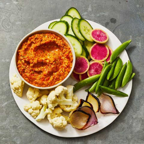 roasted pepper dip with raw vegetables to dip in