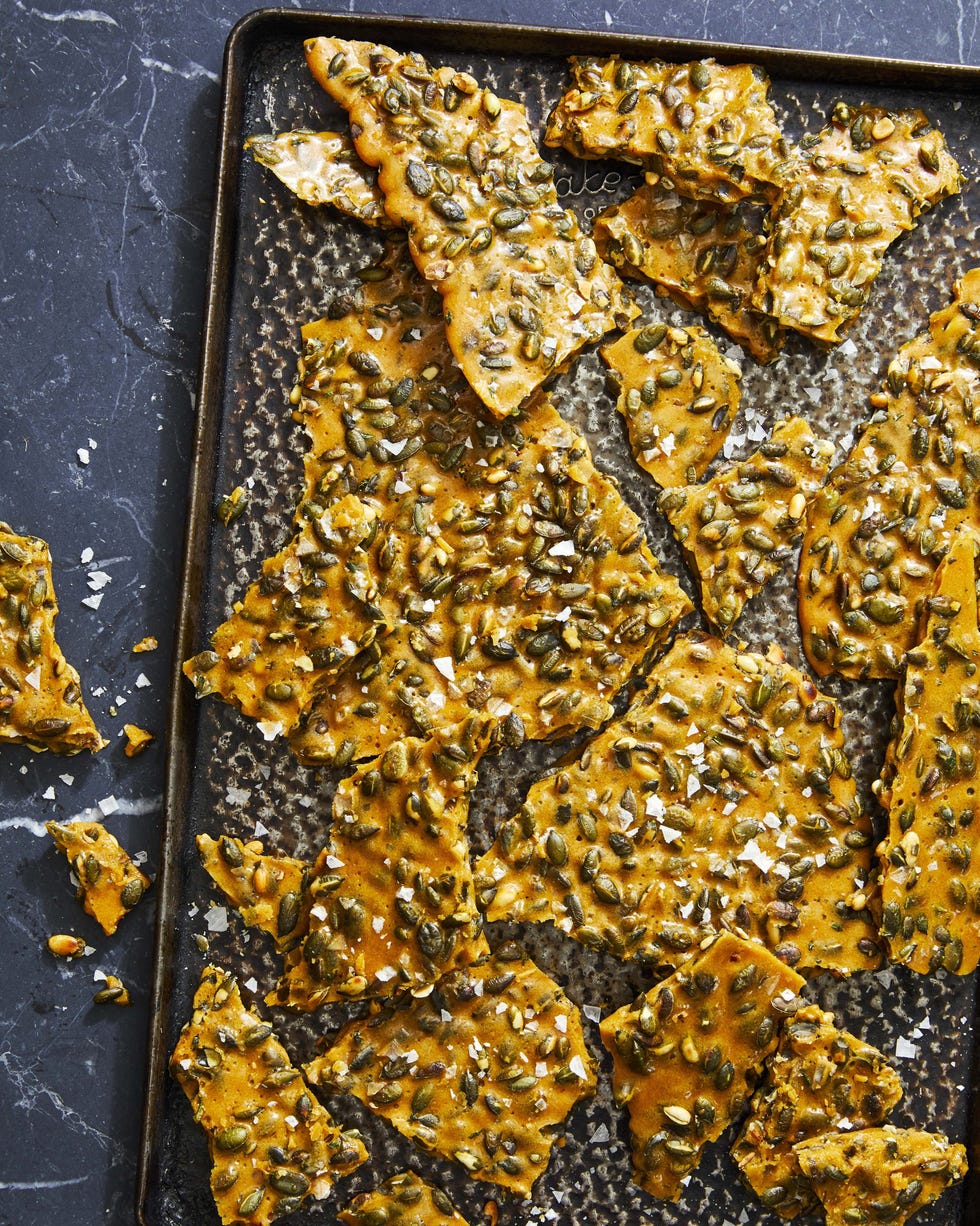 rosemary pumpkin seed brittle on a baking tray