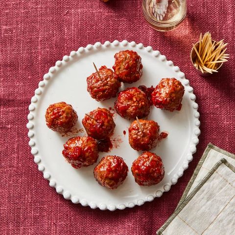 sweet sour meatballs on a white plate