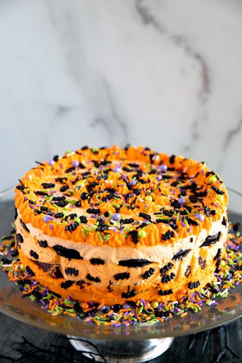 halloween icebox cake with orange frosting and sprinkles