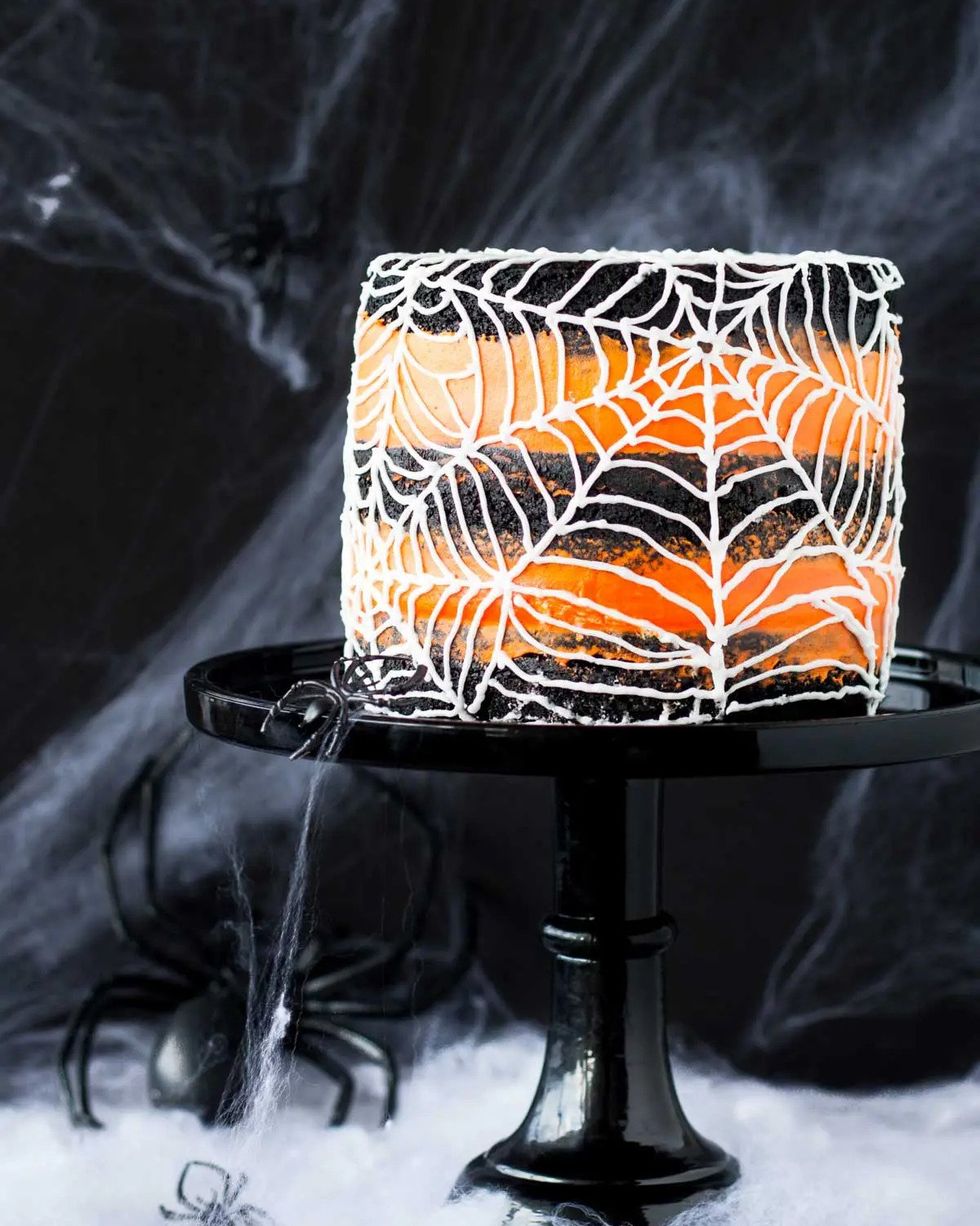 spiderweb layer cake orange and black