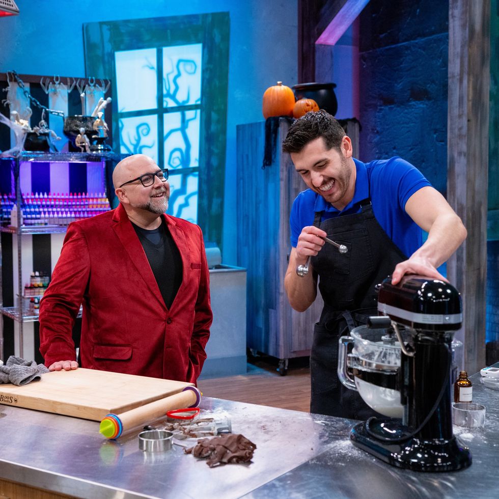 host duff goldman interacts with contestant victor carlesi, as seen on halloween cookie challenge, season 2