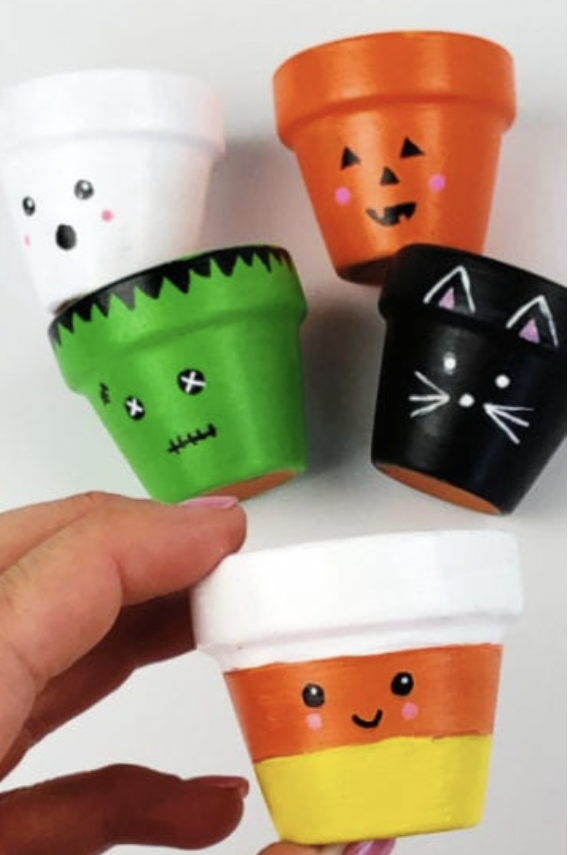 https://hips.hearstapps.com/hmg-prod/images/halloween-crafts-pots-1657548889.png?crop=0.995xw:0.912xh;0,0.0270xh&resize=980:*