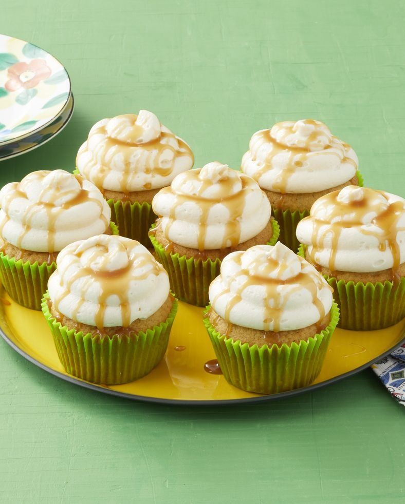 caramel apple cupcakes on green surface