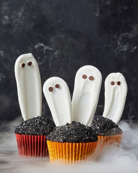 chocolate cupcakes with candied ghosts sticking out