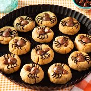 spider cookies on black plate