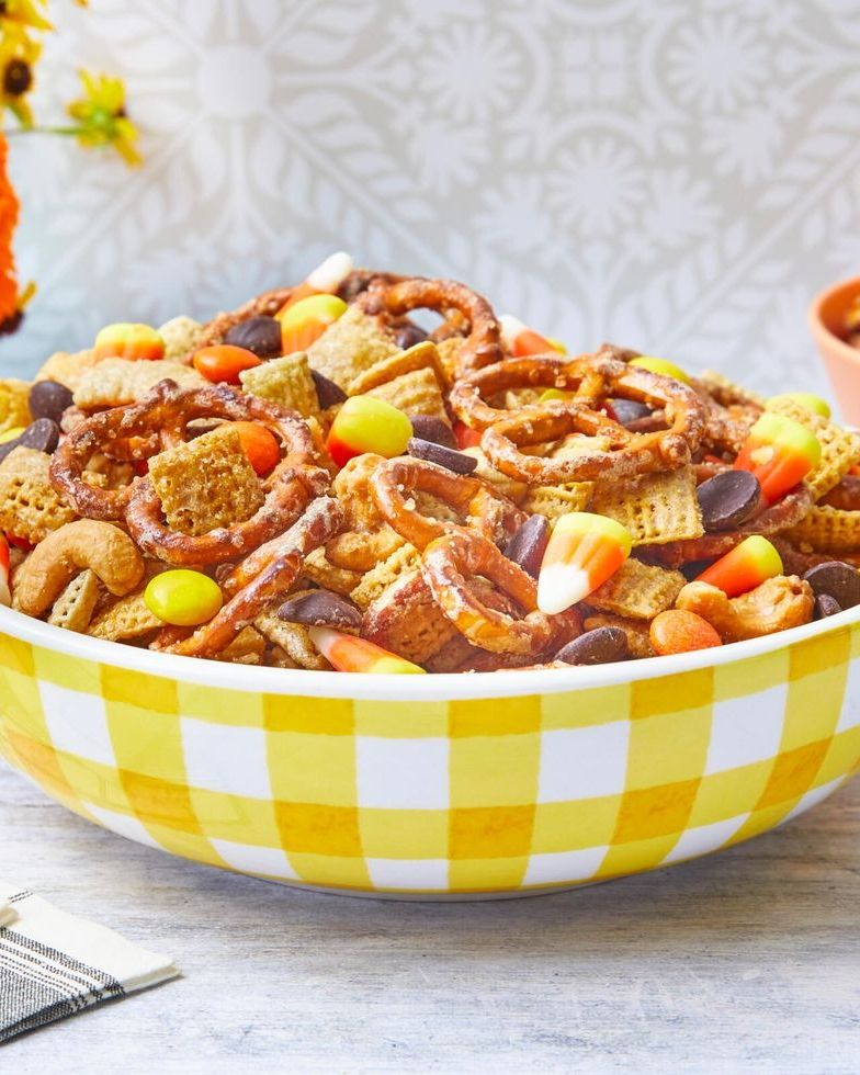 halloween chex mix in yellow checkered bowl