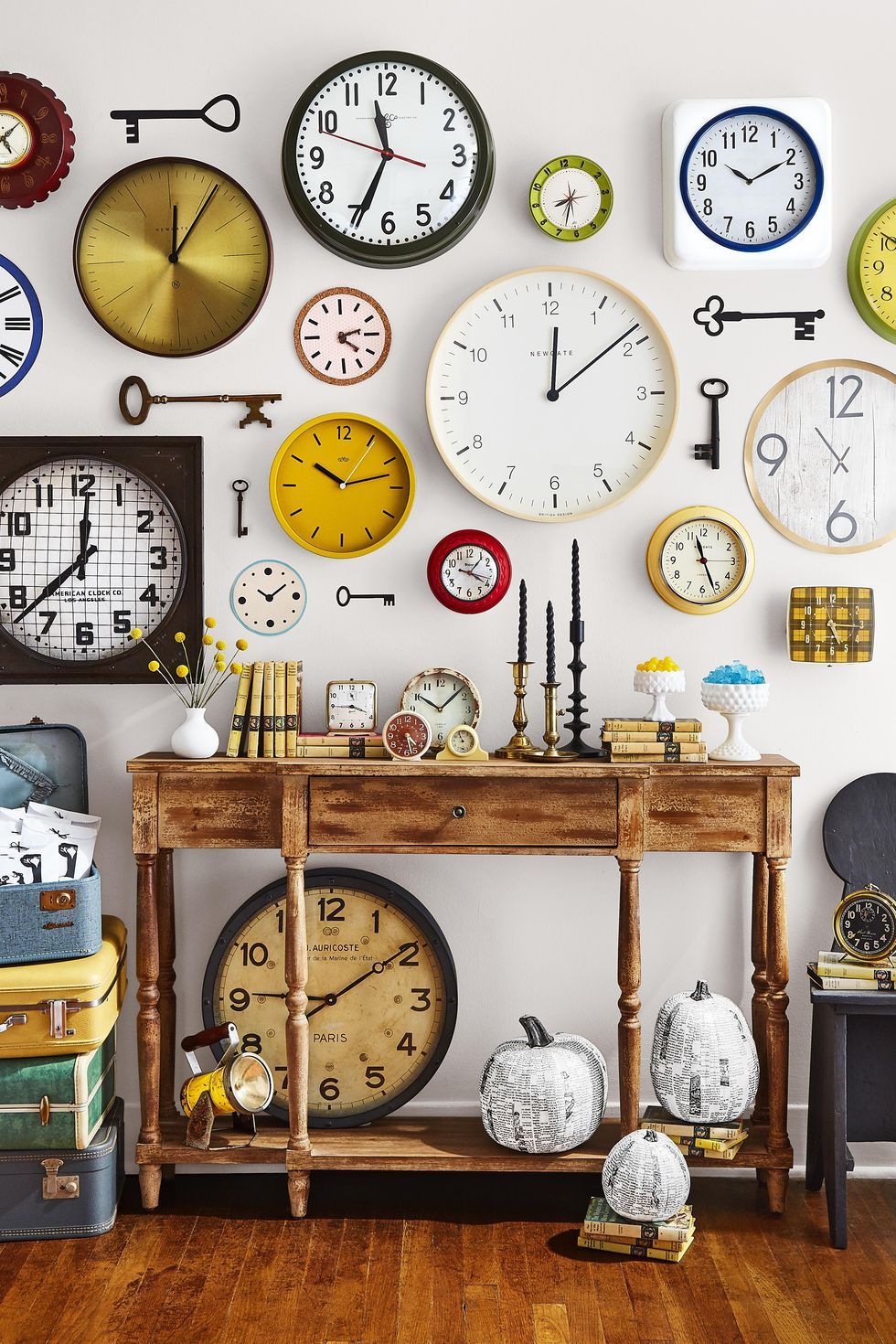 halloween murder mystery party game in a room decorated with clocks all over the wall