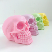 pastel colored skull candles