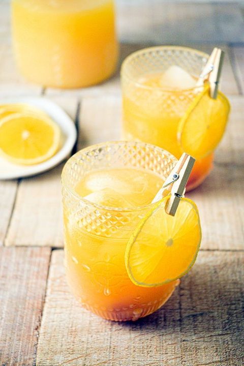fall pumpkin party punch with clothes pin and orange slice