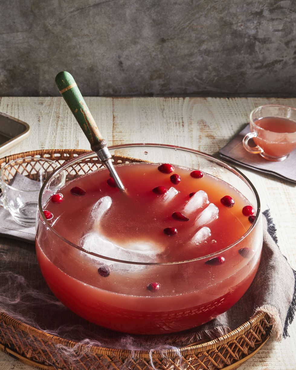 witch's brew punch with ice hands