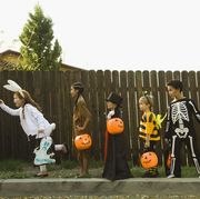 children dressed in halloween costumes