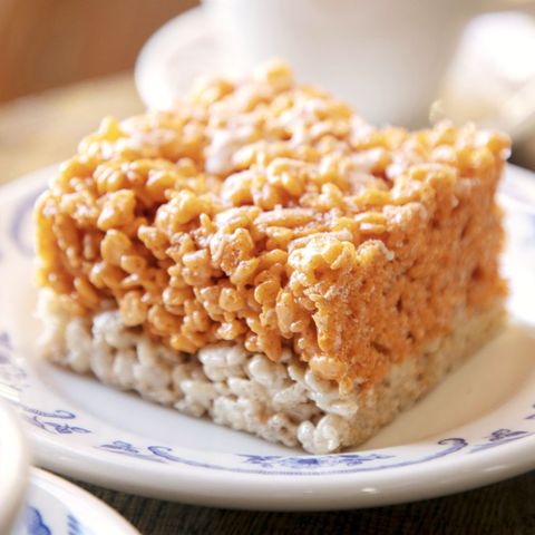 pumpkin spice cereal treats on blue and white plate