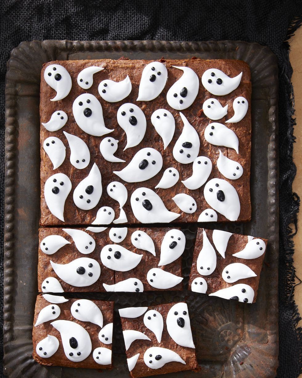 brownies with marshmallow ghosts piped on top
