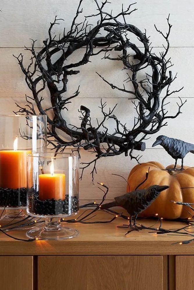 a tree with candles and birds