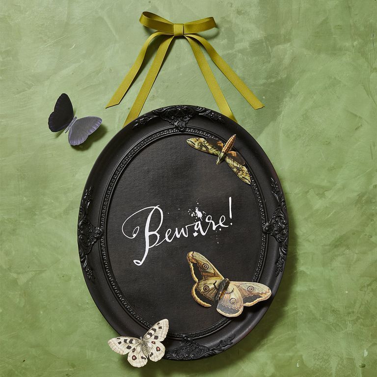 beware vintage frame with butterflies