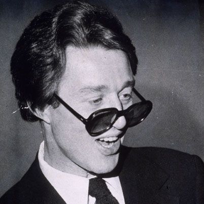 13th January 1975:  A candid portrait of American fashion designer Halston (Roy Halston Frowick, 1932 - 1990) wearing dark sunglasses pushed down to the tip of his nose, New York City. He designed hats and outfits for a number of famous personalities.  (Photo by Don Hogan Charles/New York Times Co./Getty Images)
