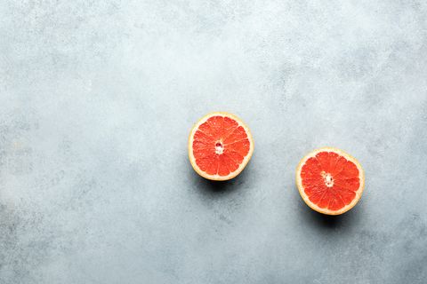 halved grapefruit background