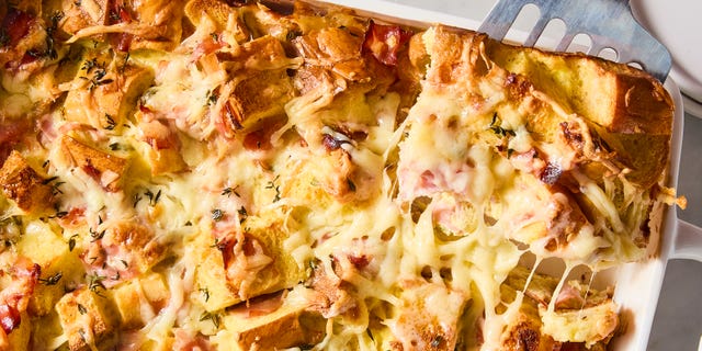 ham and cheese brunch bake in a white casserole dish