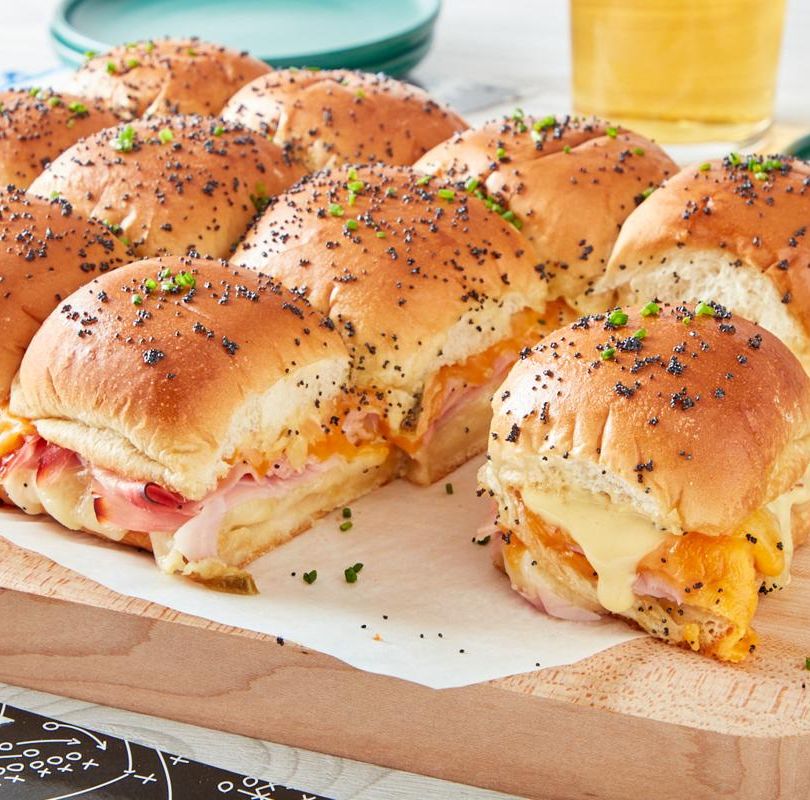 https://hips.hearstapps.com/hmg-prod/images/ham-and-cheese-sliders-recipe-2-1672763707.jpg?crop=0.506xw:1.00xh;0.327xw,0&resize=1200:*