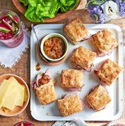 ham biscuit sandwiches with apricot mustard on a tray