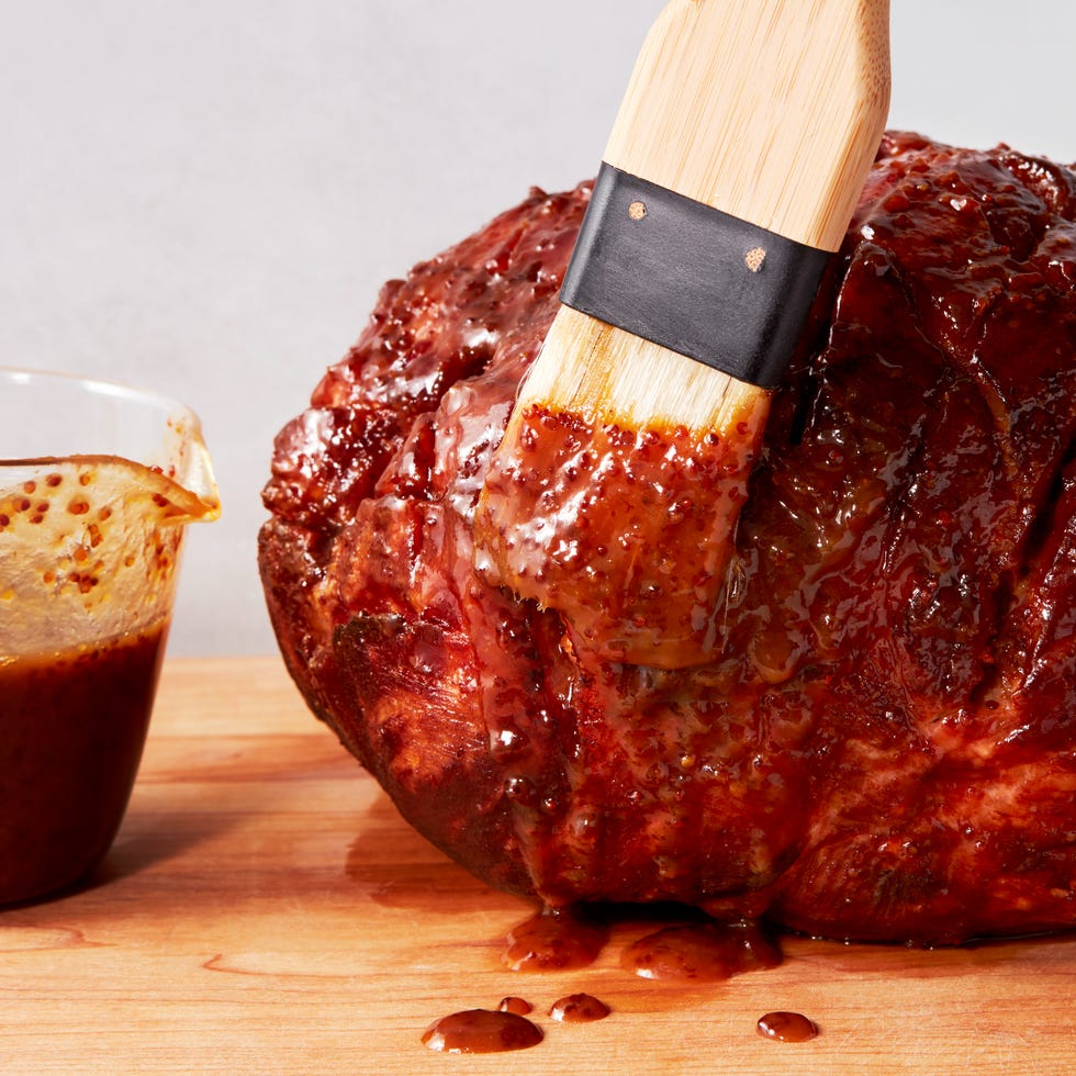 ham glaze in a plastic measuring cup