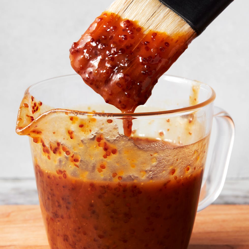 ham glaze in a plastic measuring cup