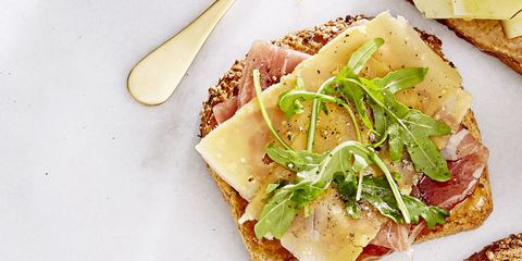 fig ham tapas toast with fresh herbs on top