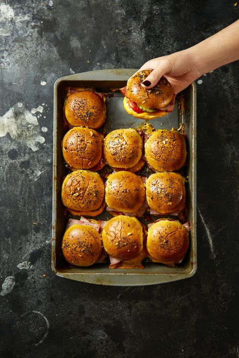 ham and cheese oven sliders in a baking dish