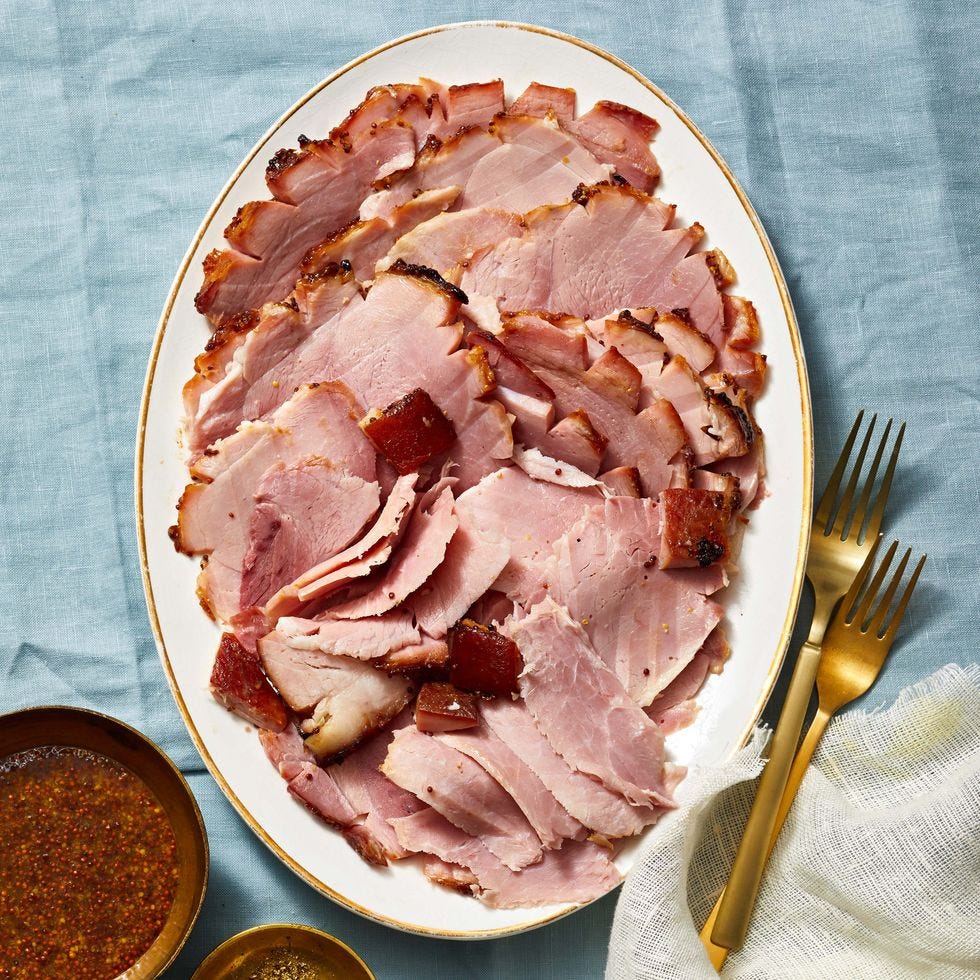 ham recipes honey balsamic glazed ham on a white plate