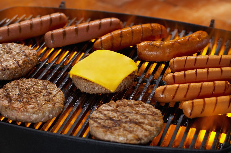 hamburgers and hot dogs on grill