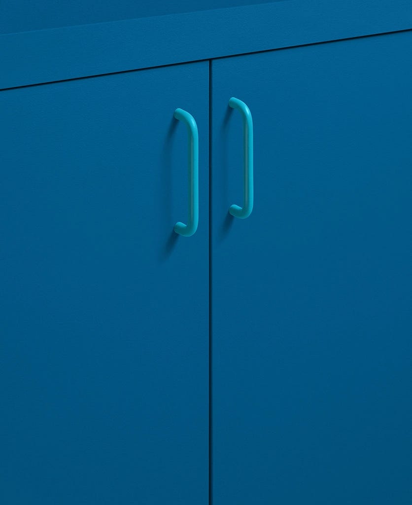 a door handle on a blue wall