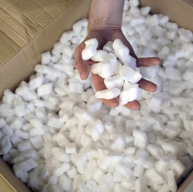 hand holding packing peanuts