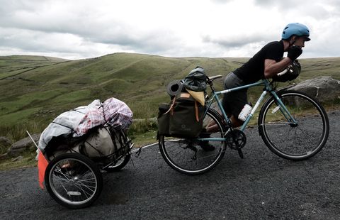 HandleBard Tom Dixon pushes his bike up a Yorkshire dale.
