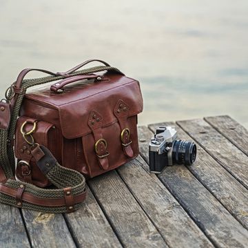handmade leather bag with vintage camera