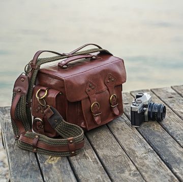 handmade leather bag with vintage camera