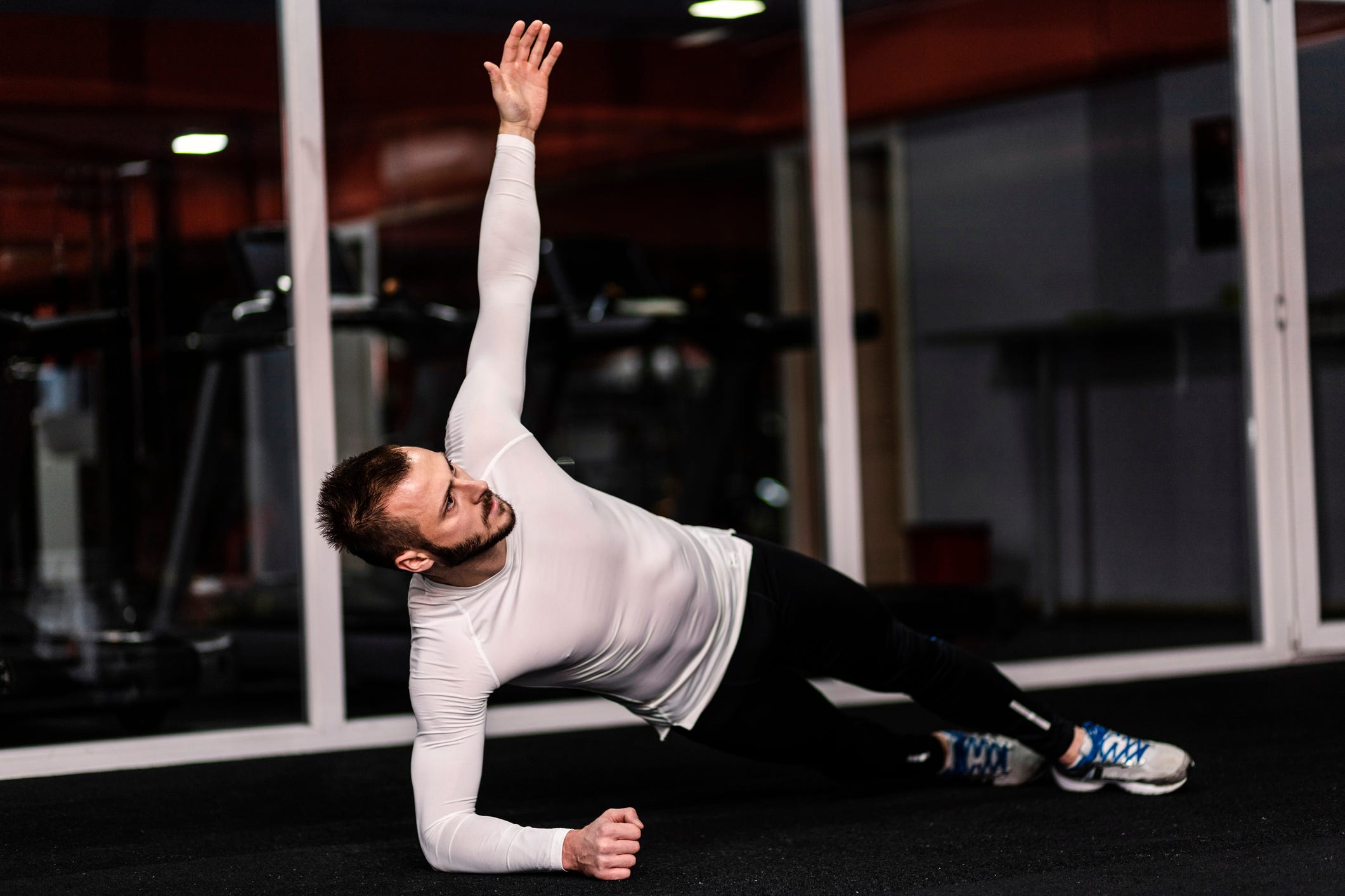 handsome fit manbdoing exercise in gym